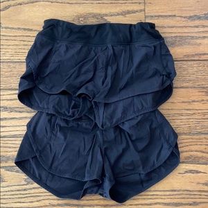 2 black Ivivva workout shorts for girls size 14.